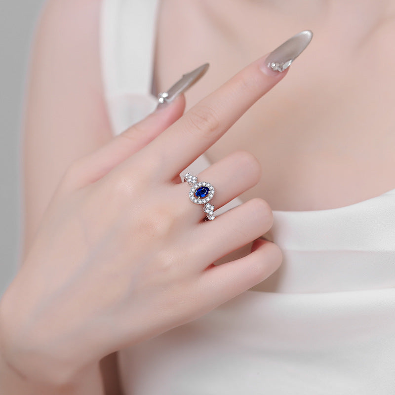 Prinzessin Diana Verlobungsring mit ovalem Saphir-Halo-Schliff und 0,5 Karat Moissanit S925