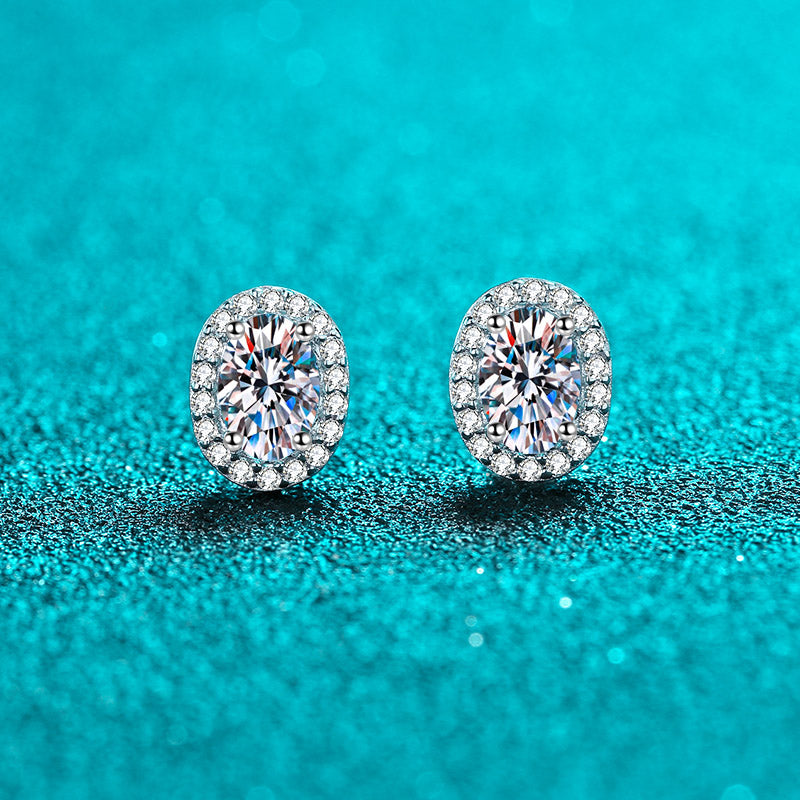 Aretes S925 chapados en platino con diamantes de moissanita de 0,5/1 quilate con halo de talla ovalada 