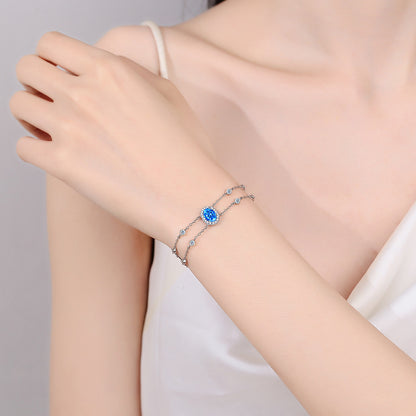 Gaia Blue/White Halo Oval 1 Carat Moissanite Bracelet — Moisza