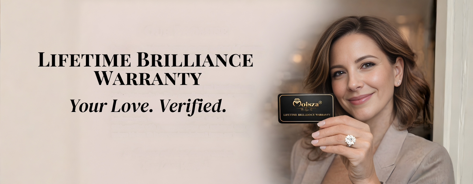 Woman wearing a diamond ring is holding Moisza's 'Lifetime Brilliance Warranty' card