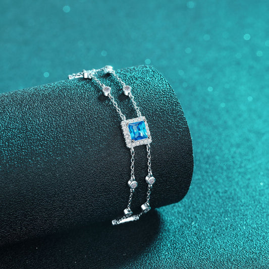 Blau/weißes Halo-Armband mit 1 Karat Moissanit-Diamant im Princess-Schliff S925 